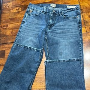 Men’s 32x34 Moon Shine slim boot cut jeans.